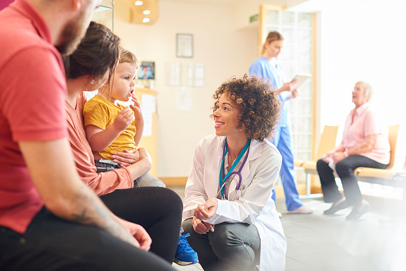 doctor talking to patients